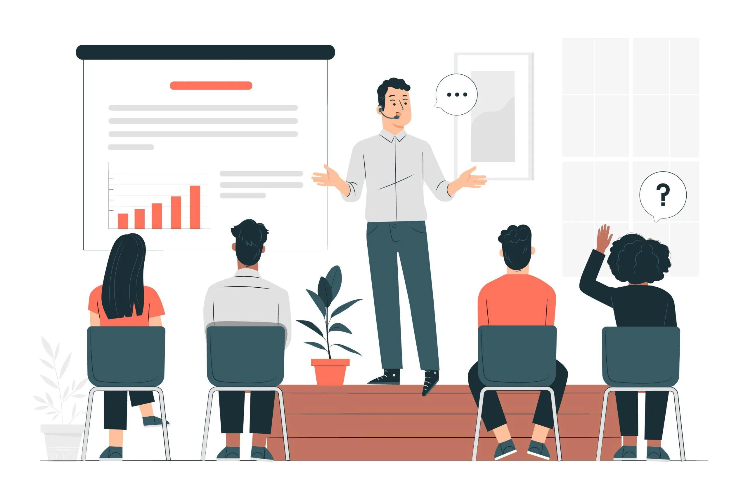 A man standing in the office explaining something in front of people