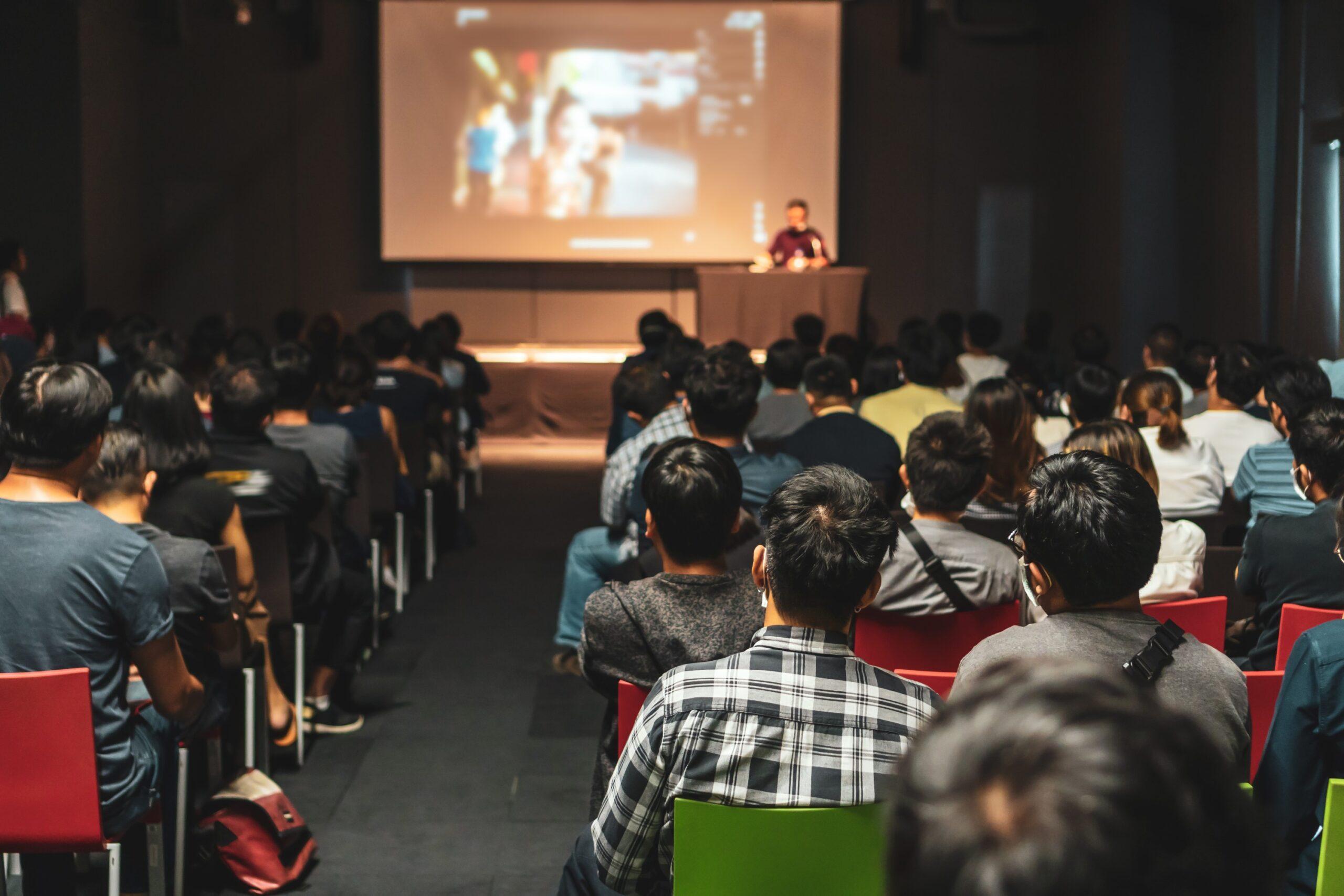 rear-view-asian-audience-joining-listening-speaker-talking-stage-seminar