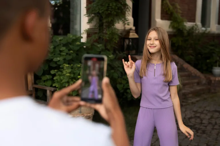 side-view-smiley-girl-recording-video