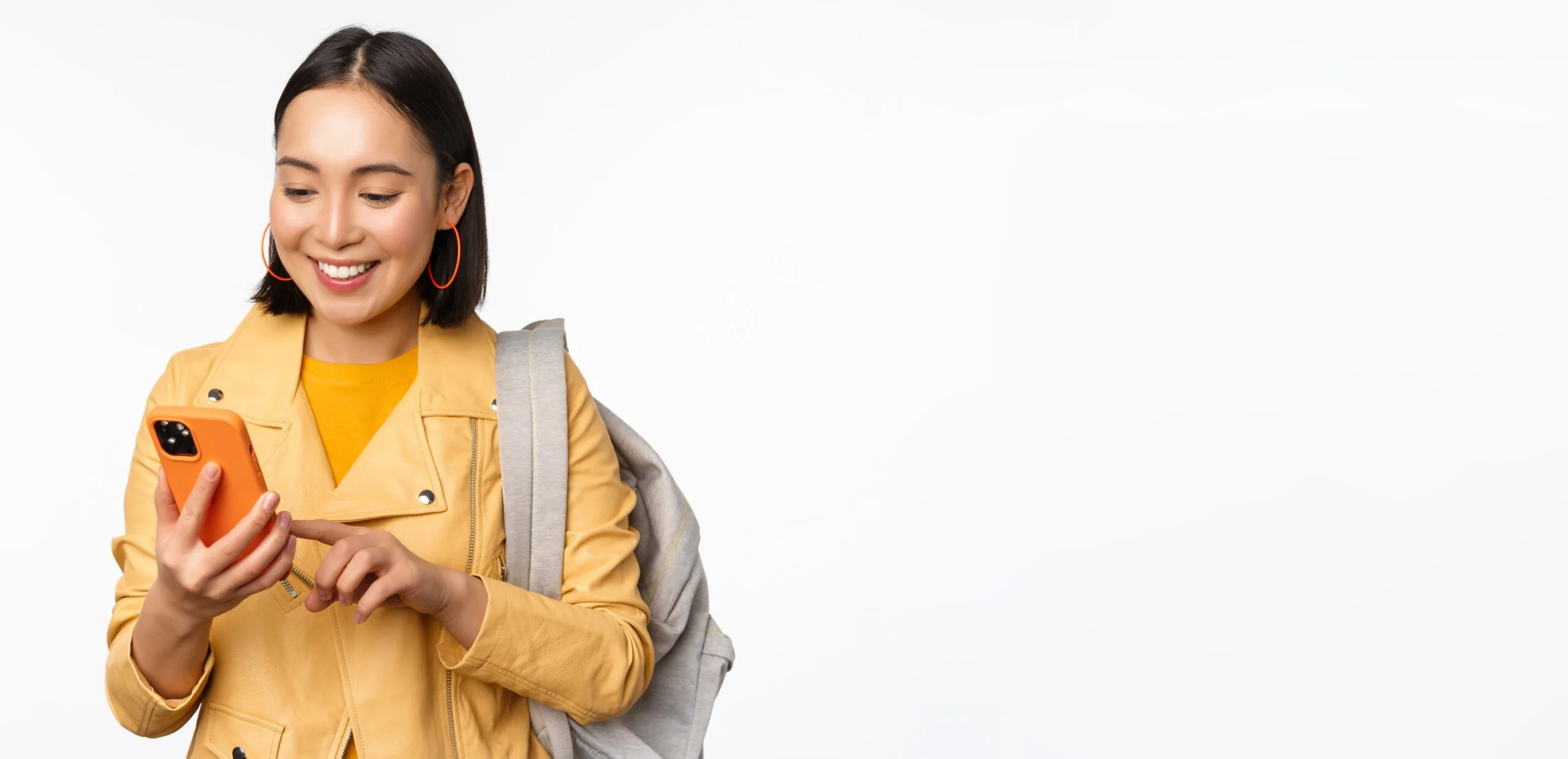 image-happy-girl-traveller-tourist-with-backpack-looking-smartphone-using-mobile-phone-route-app-sta