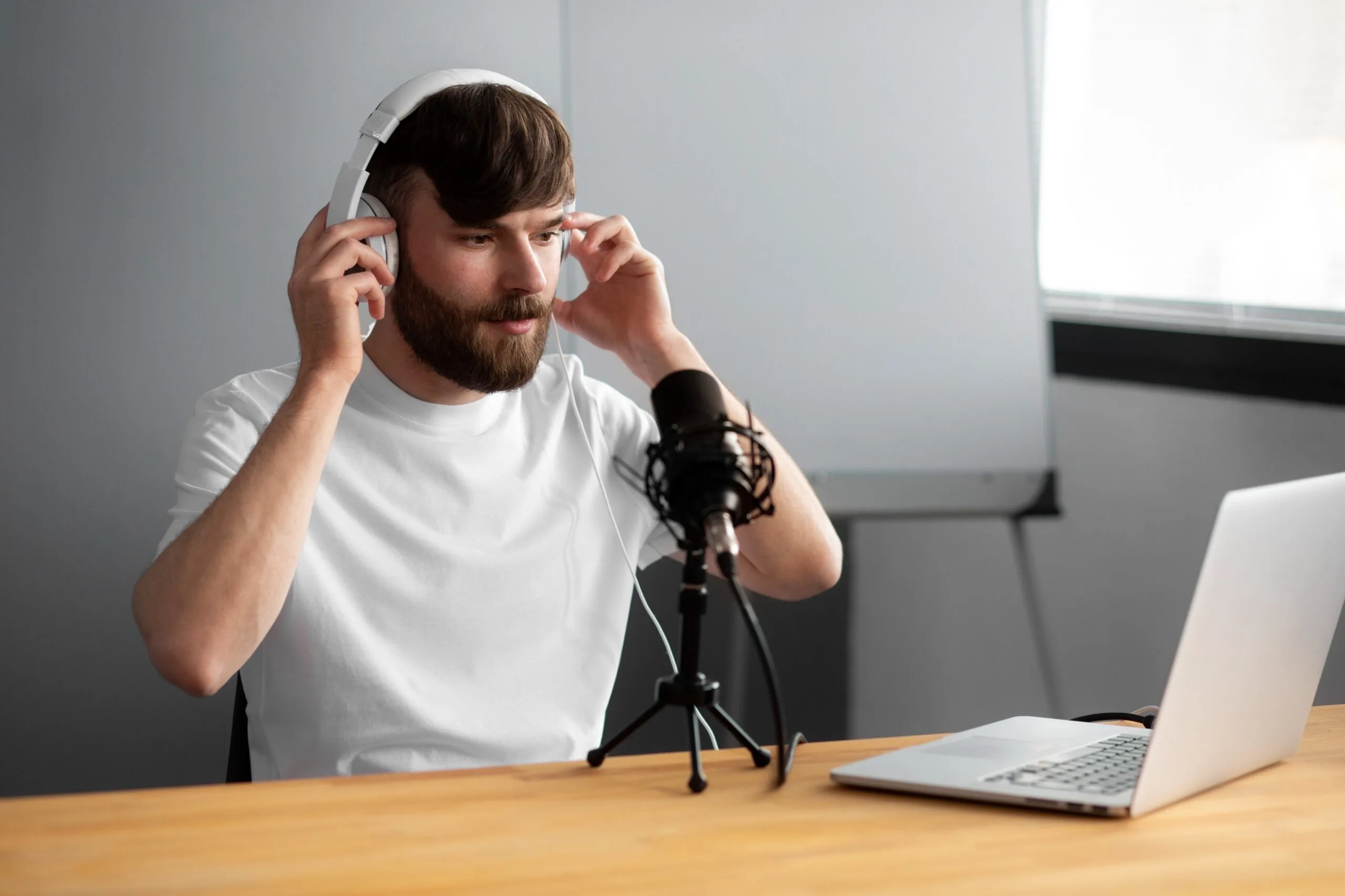 medium-shot-man-recording-podcast