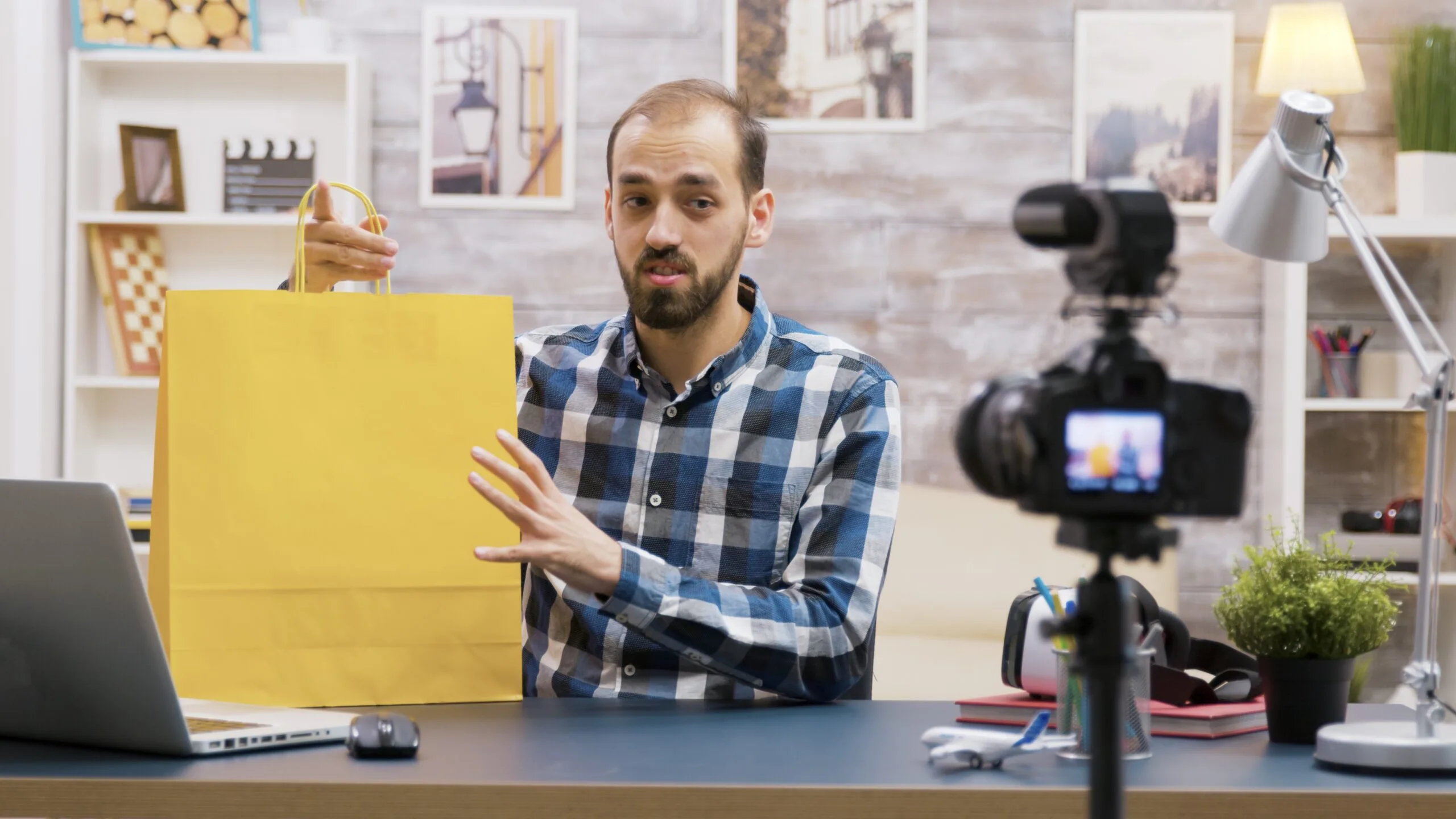 young-vlogger-presenting-special-giveaway-his-followers-famous-influencer-creative-content-creator