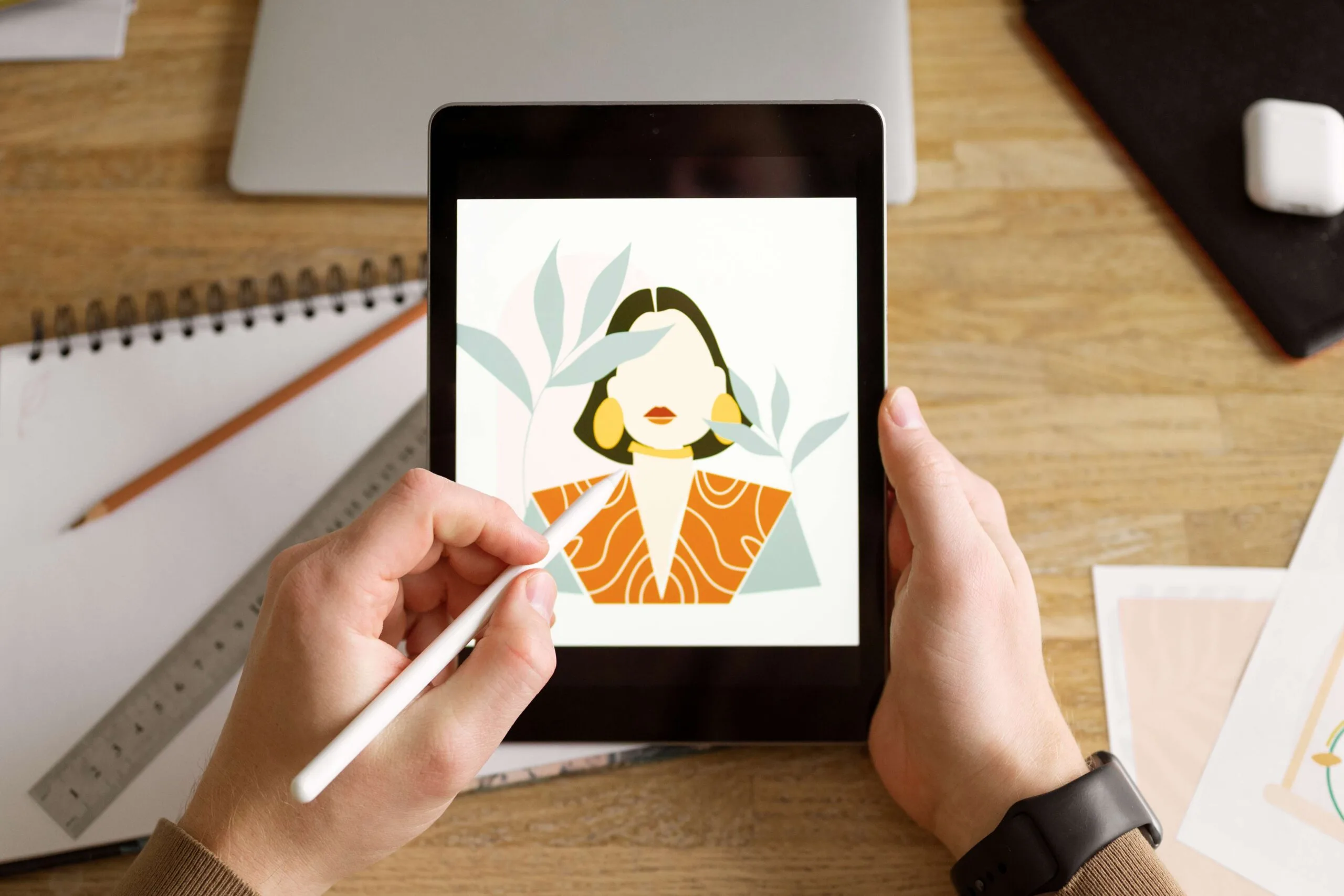 adult-male-illustrator-working-tablet-device