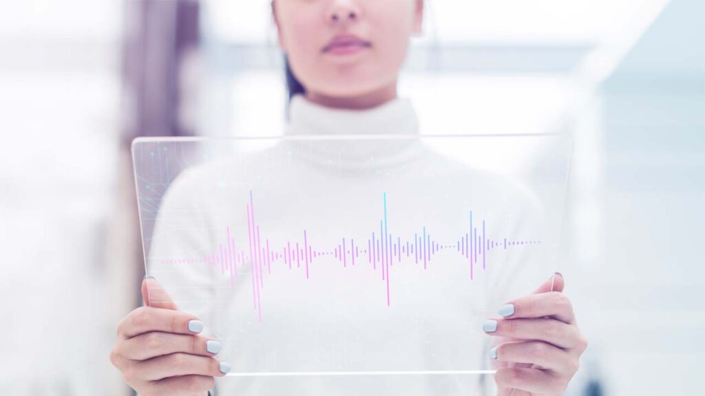 woman holding futuristic tablet with voice over