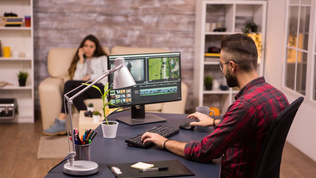 videographer at a desk