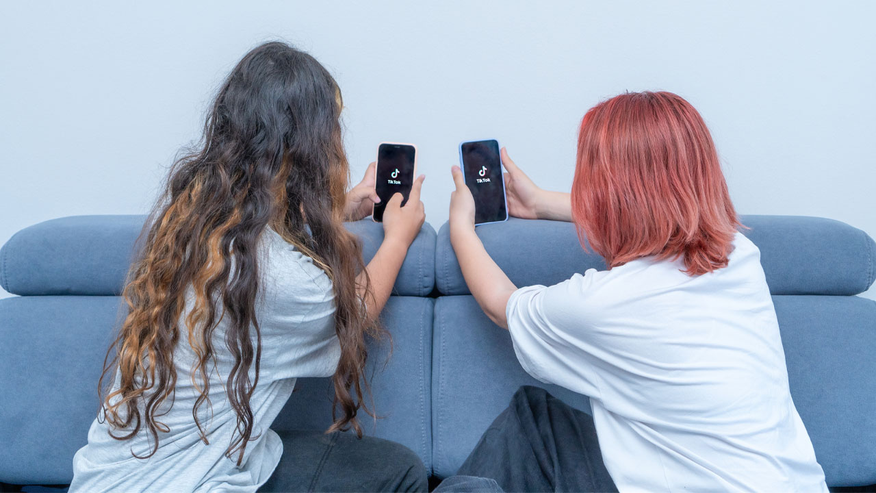 two girls on tiktok mobile