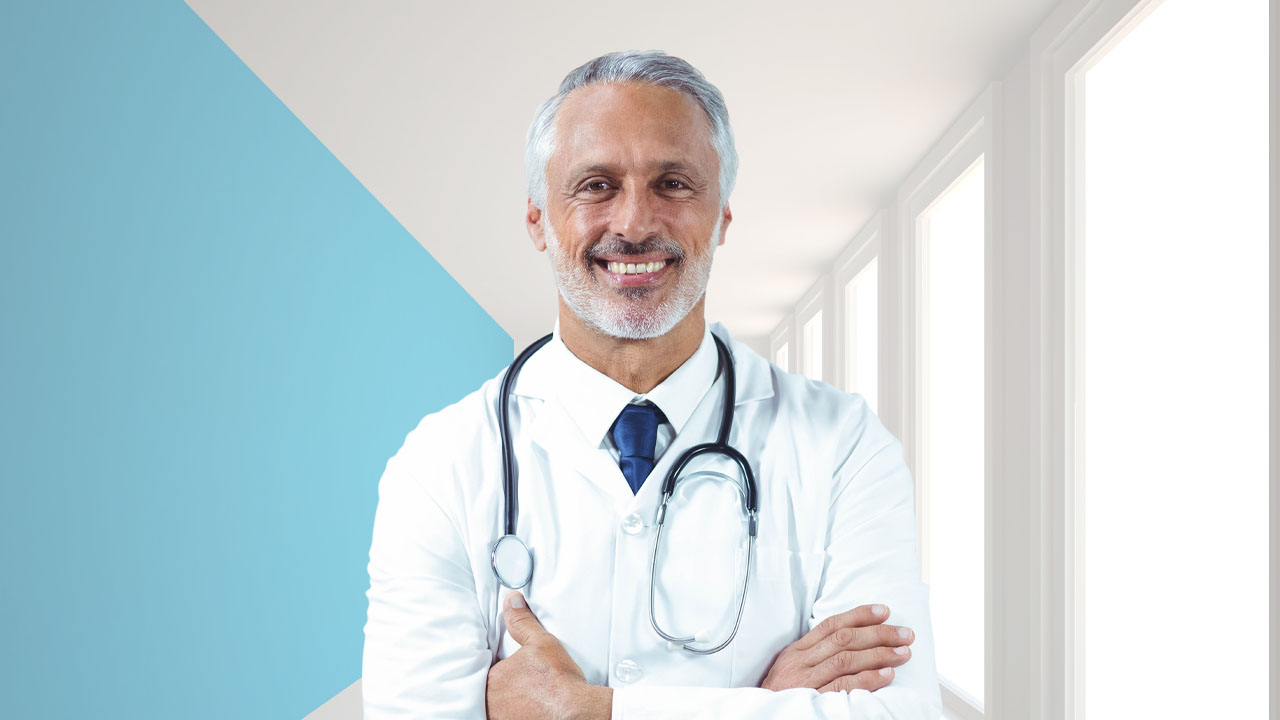 doctor wearing a stethoscope and smiling