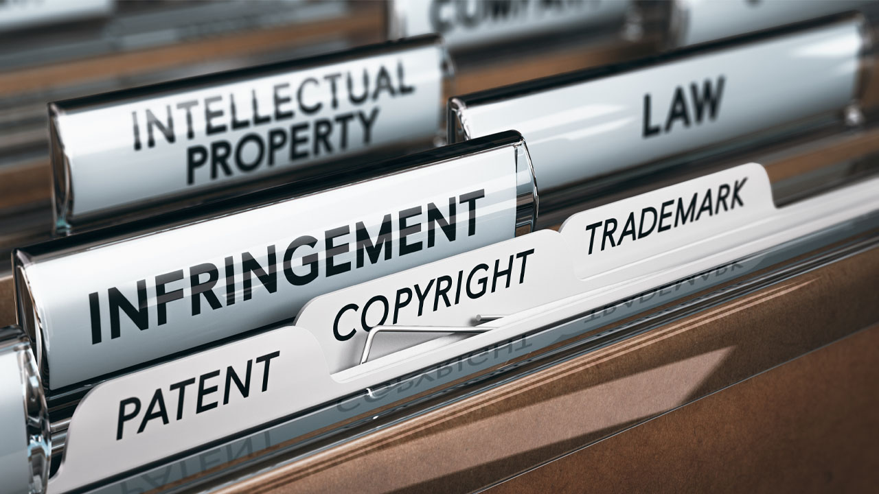a file folder full of intellectual property rights and documents