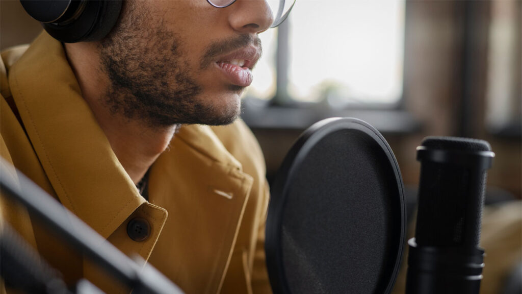 a man speaking into a microphone