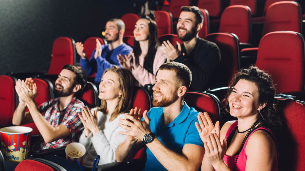 an attentive audience enjoying a video