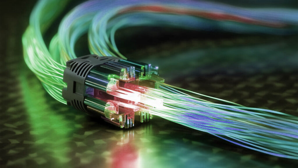 a colorful digital fiber optic cable with high-speed data going through it