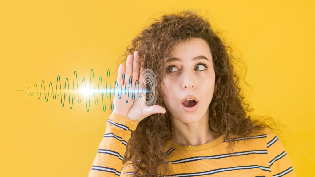 woman hearing audio waves