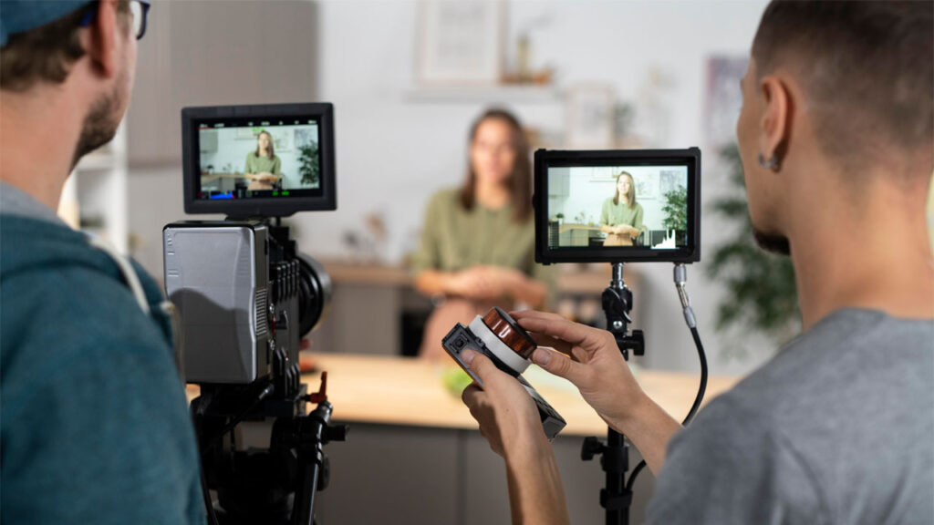 people recording a business video