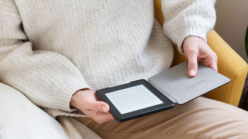 man using the text to speech feature on his kindle tablet