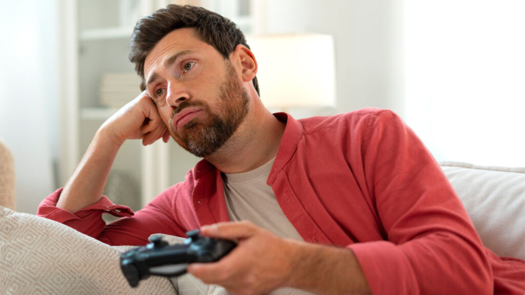 a man frustrated with a video game