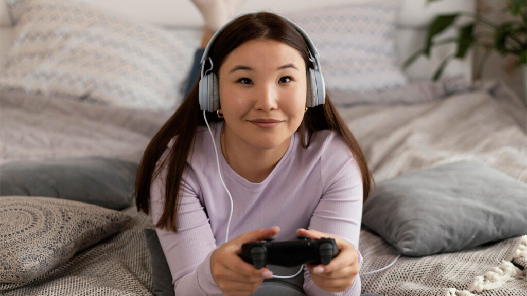 a woman enjoying a video game