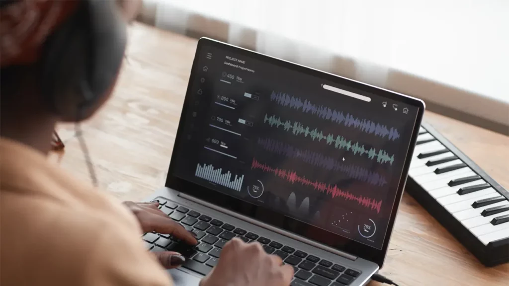 a person adjusting the text to speech settings on their macbook laptop