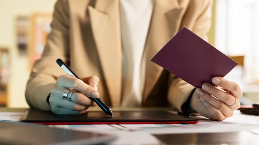 a woman signing digitally