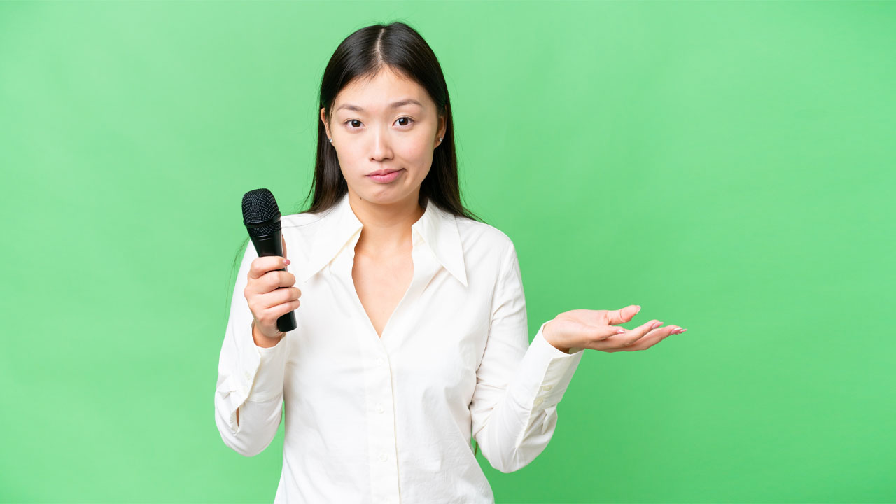 female voice actor shrugging