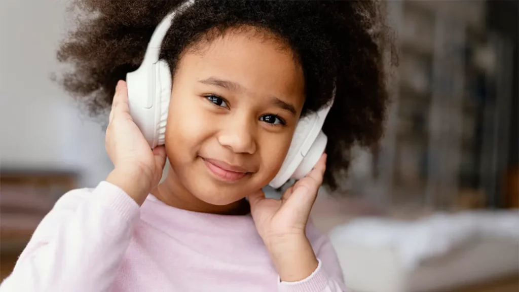 a young girl listening to AI voices on her headphones