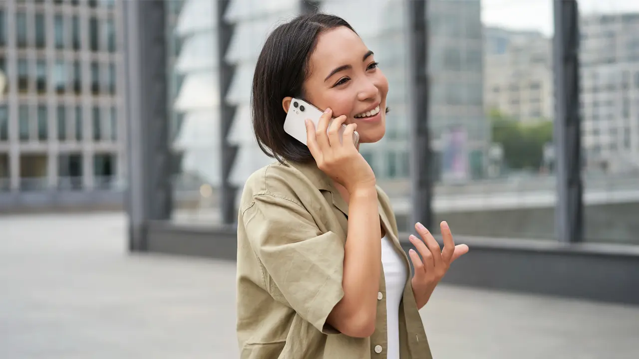 woman on phone in street