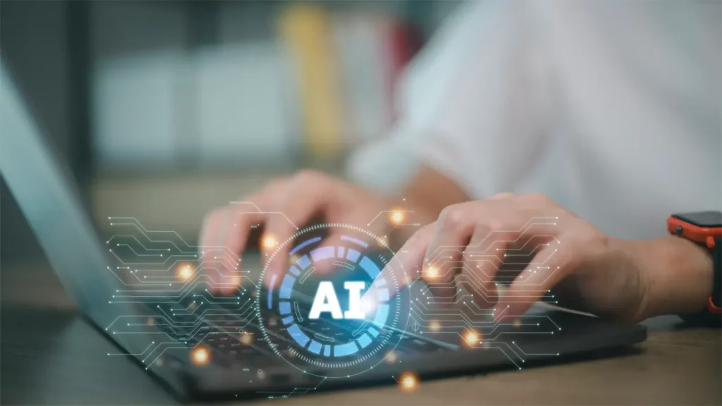 A person using AI on his laptop.