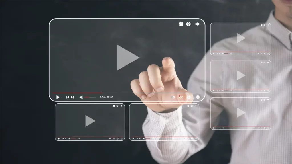 A person interacting with various different online videos.