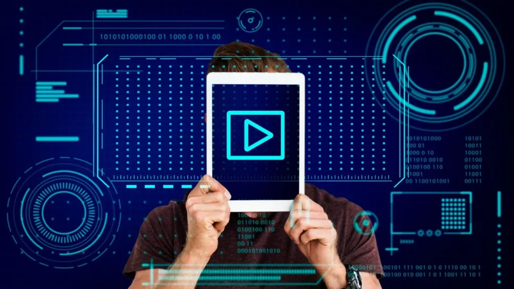 Person holding a tablet with a play button in a futuristic interface.