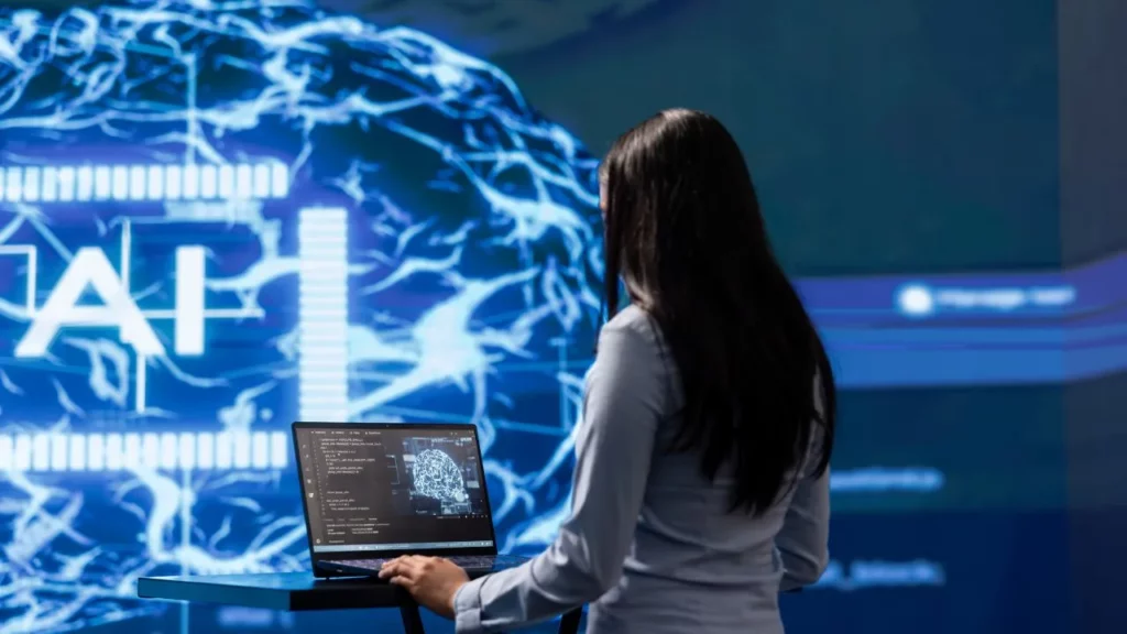 Woman working on a laptop with a futuristic AI-themed background.