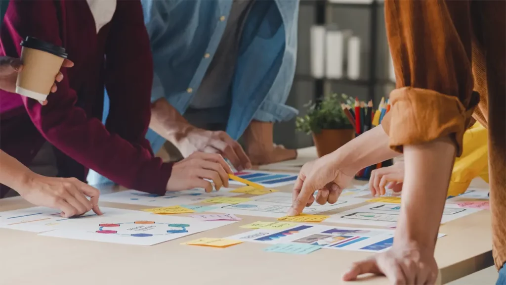 A group of people strategizing.