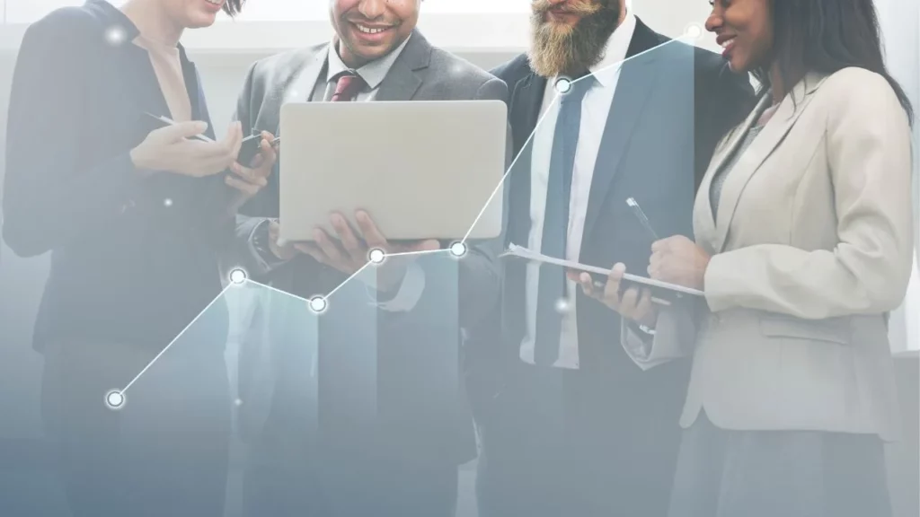 A group of business professionals standing together, with a glowing upward-trending line graph overlaid across them.